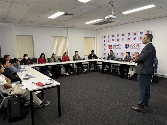 Students and staff at a SMIC orientation session — photo 2