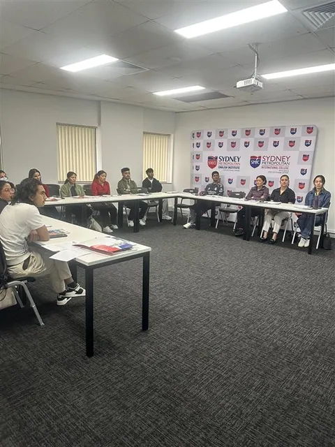Students and staff at a SMIC orientation session — photo 4