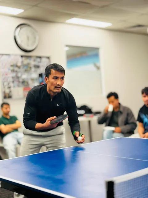Students taking part in the SMIC table tennis competition — photo 7