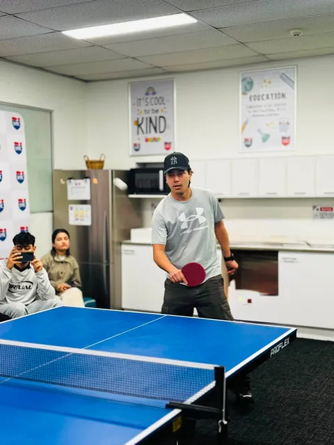 Students taking part in the SMIC table tennis competition — photo 9