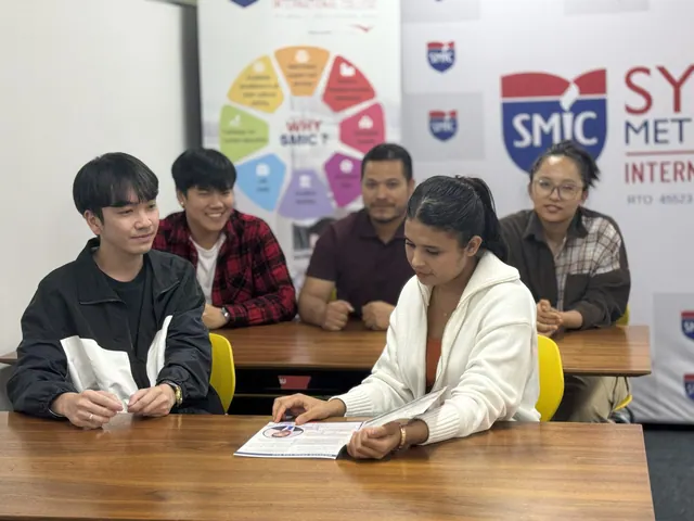 SMIC students and staff posing for a group photo — photo 3