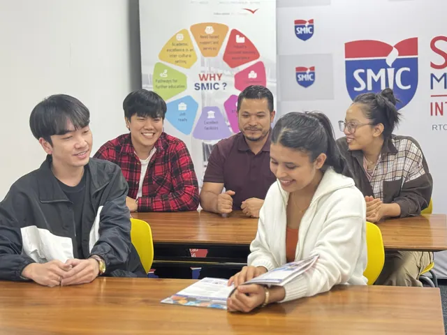 SMIC students and staff posing for a group photo — photo 5