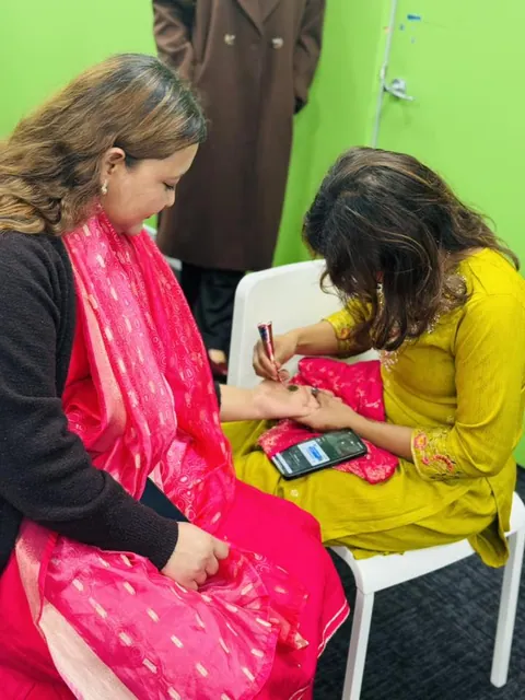 The SMIC community taking part in the Teej celebration — photo 4