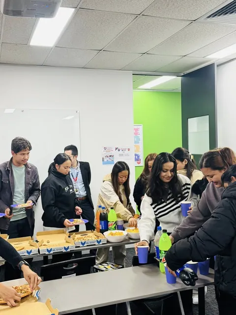 The SMIC community gathering at a welcome party — photo 1